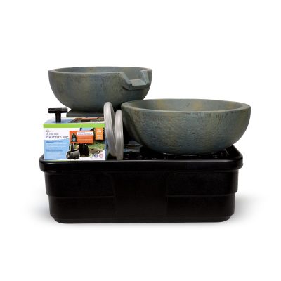 Two greenish bowls, a water pump, tubing, and a black container arranged as parts of a water feature kit.