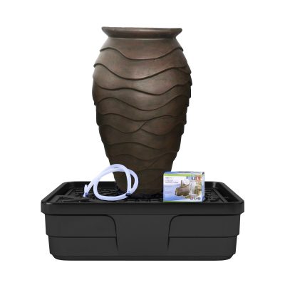 Large brown water fountain kit with wavy design, white hose, and packaging, displayed on a black basin tray.
