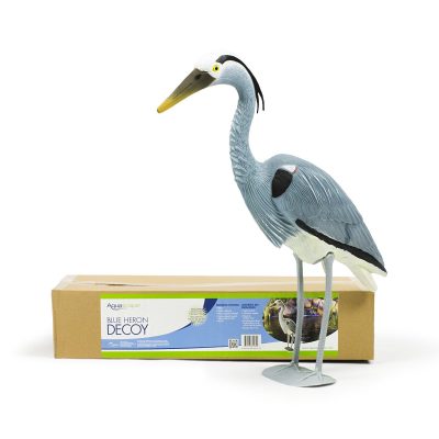 A blue heron decoy stands in front of its labeled cardboard packaging box.
